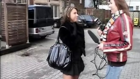 A real whore who has her big boobs photographed on the street while she goes to fuck with her partner